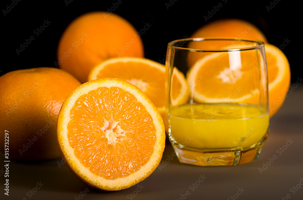 Fresh orange juice. Orange juice in a beautiful glass. Juicy orange. Fresh orange juice. Orange juice in a beautiful glass. Juicy orange.