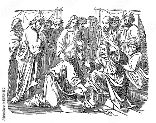 Vintage drawing or engraving of biblical story of Jesus washes his disciples feet. Bible,New Testament,John 13. Biblische Geschichte , Germany 1859.