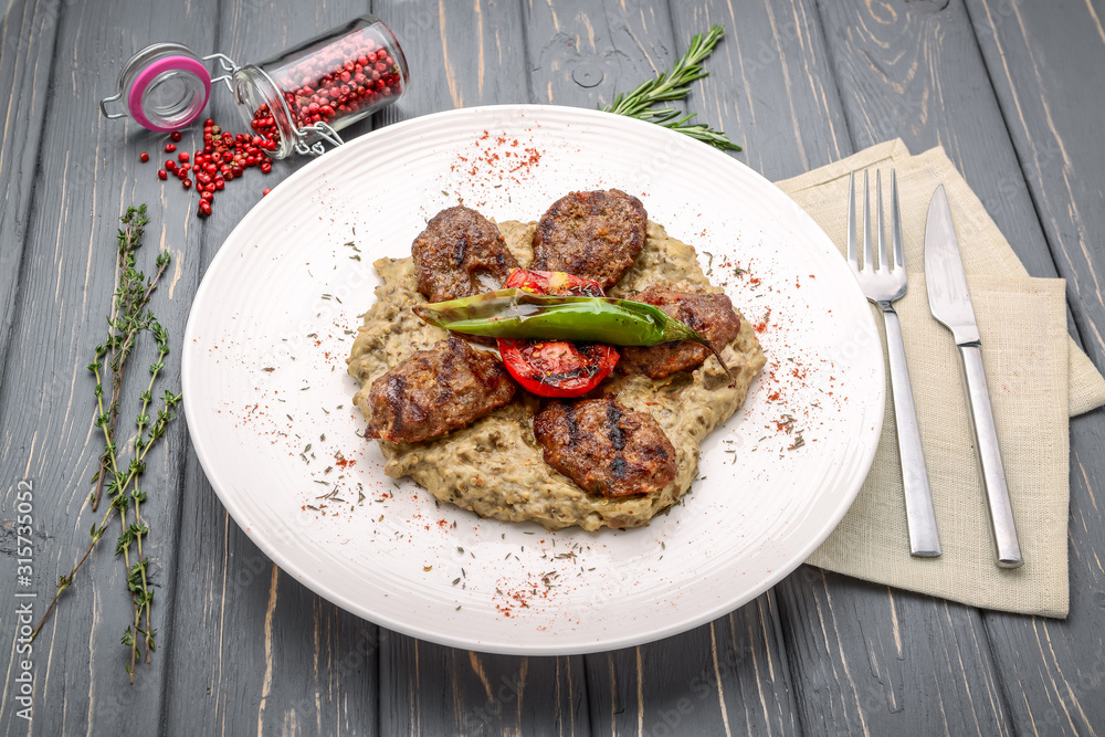 Grilled veal meatballs with vegetable side dish Grilled veal meatballs with vegetable side dish