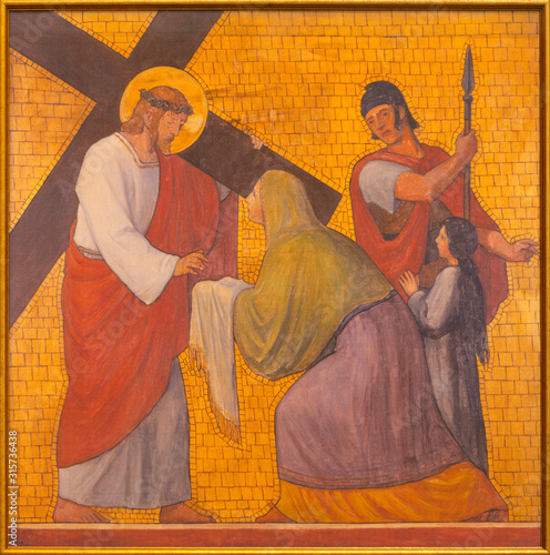 PRAGUE, CZECH REPUBLIC - OCTOBER 17, 2018: The painting Veronica wipes the face of Jesus in the church kostel Svatého Cyrila Metodeje by  S. G. Rudl (1935). photo