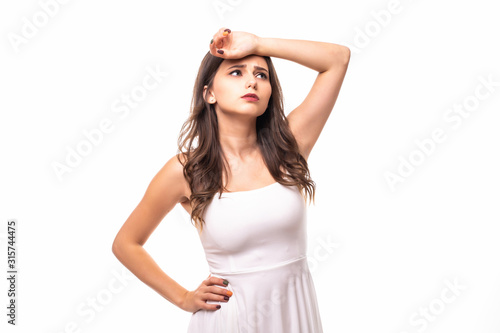 Portrait of young woman look tired isolated on white background © F8  \ Suport Ukraine