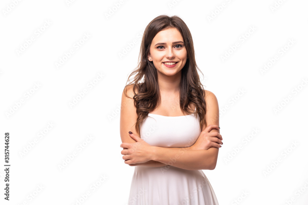 Portrait of a beautful happy woman standing with arms folded isolated on a white background. Portrait of a beautful happy woman standing with arms folded isolated on a white background.