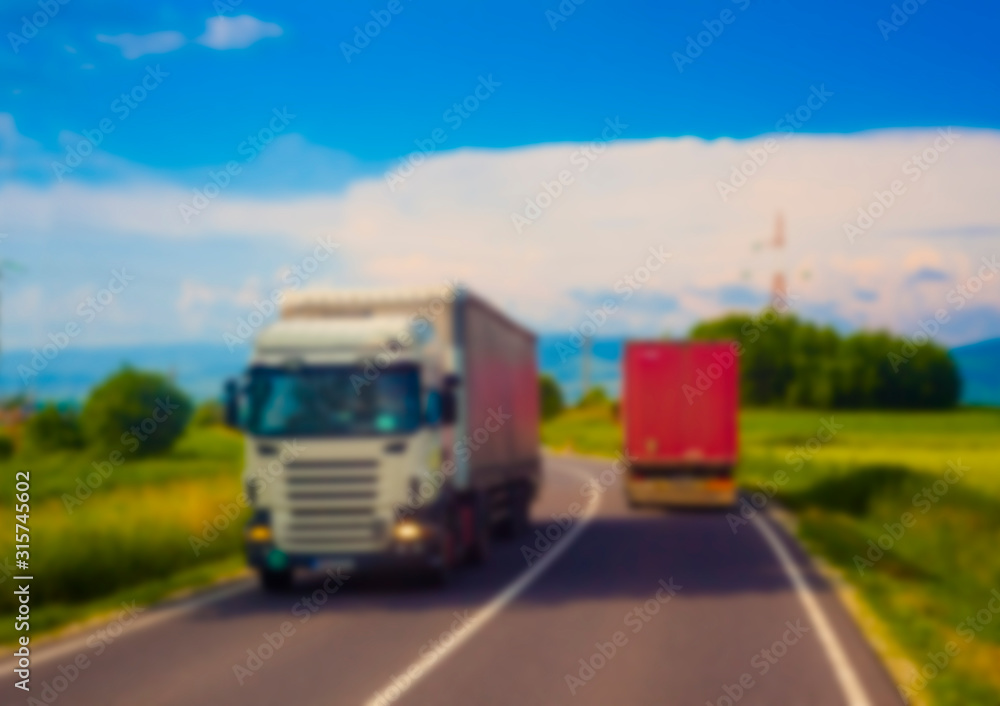 abstract blur of truck driving on road. transportation concept