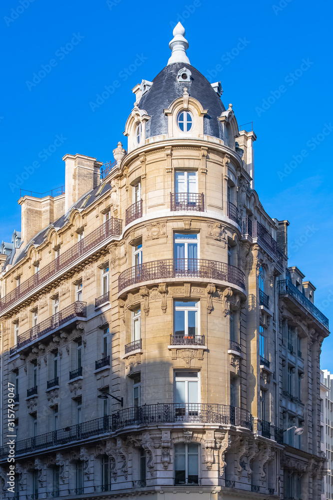 Fototapeta Paris, typical facade and windows, beautiful building rue Reaumur
