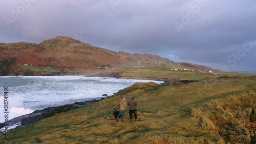 Huge waves breaking at Muckross Head - A small peninsula west of Killybegs, County Donegal, Ireland. The cliff rocks are famous for climbing photo