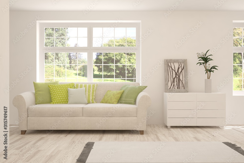 Fototapeta premium Stylish room in white color with sofa and summer landscape in window. Scandinavian interior design. 3D illustration