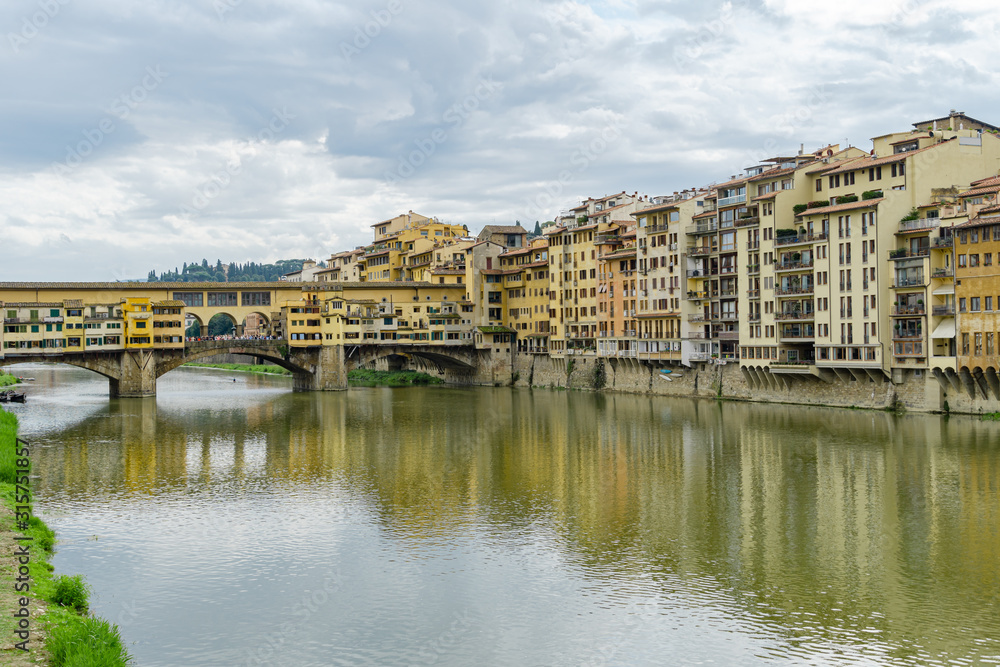 Ponte Vecchio bridge across Arno river in Florence