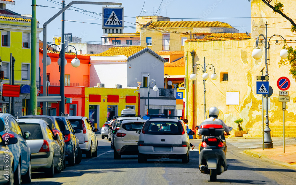 Street Cityscape of motorcycle on road at Cagliari city in South