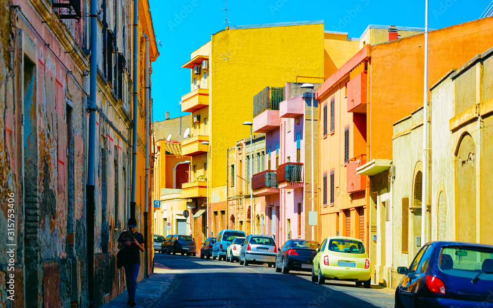 Street Cityscape of car road at Cagliari city at the Mediterranean Sea in South Sardinia in Italy. Sardinian Italian small town in Sardegna. Urban district. Province. Mixed media.