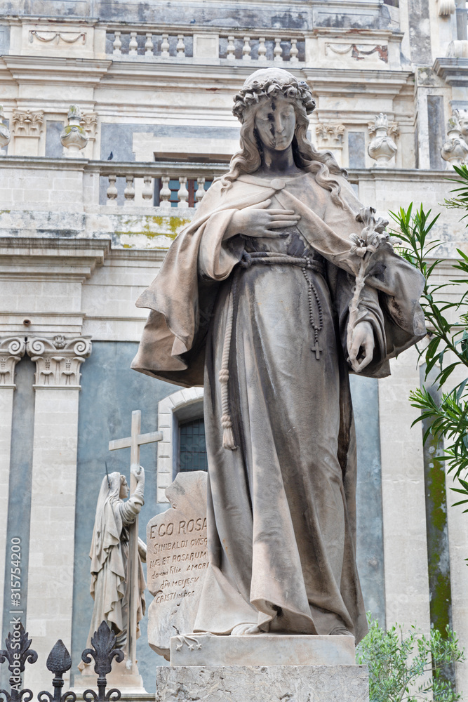 CATANIA, ITALY - APRIL 7, 2018: The statue of St. Lucy in front of Basilica di Sant'Agata.