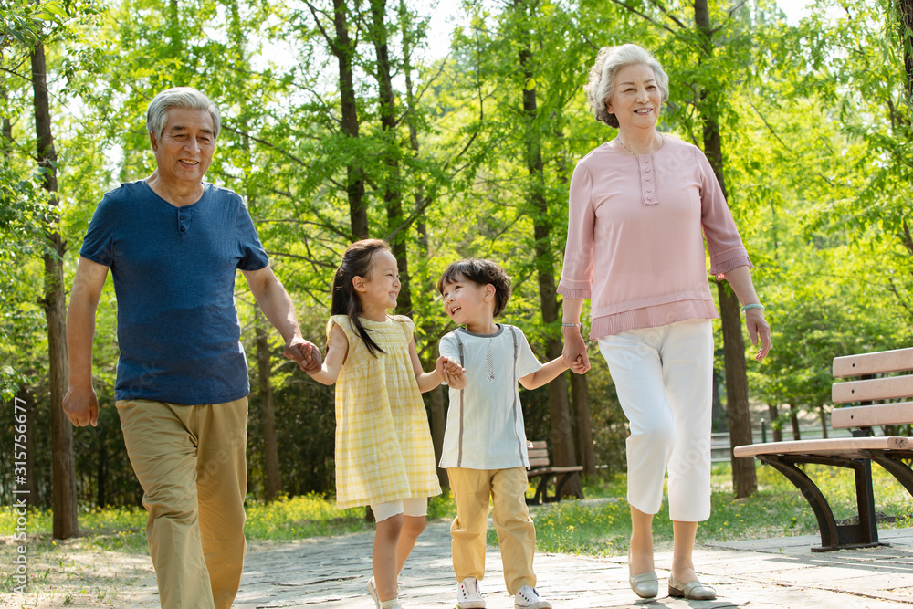 Elderly couples with children on an outing Elderly couples with children on an outing