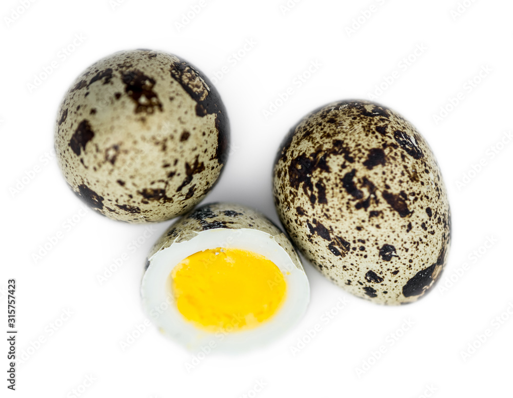 Fototapeta premium Quail Eggs isolated on white background (selective focus; close-up shot)