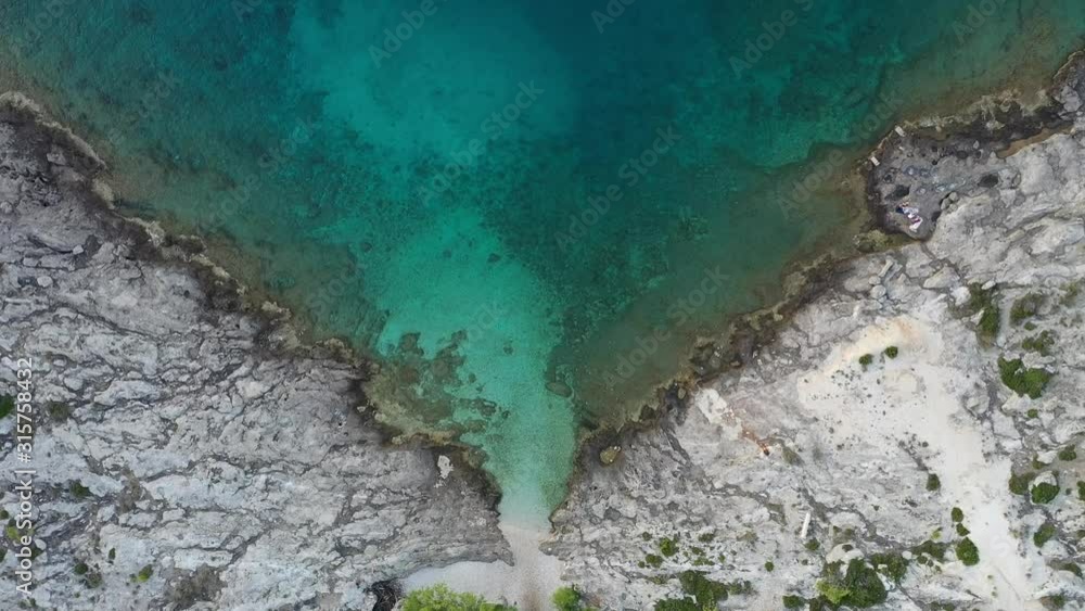 Aerial top view of beautiful sea, waves hitting the shore. Concept for sea and ocean. Shot in Brac Island, Croatia. Adriatic Sea. Aerial top view of beautiful sea, waves hitting the shore. Concept for sea and ocean. Shot in Brac Island, Croatia. Adriatic Sea.