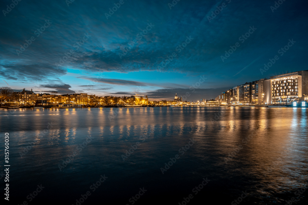 Amsterdam skyline shortly after sunset (the Netherlands) Amsterdam skyline shortly after sunset (the Netherlands)