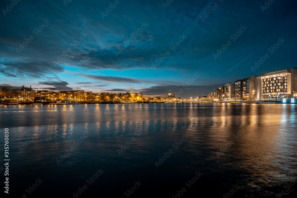 Amsterdam skyline shortly after sunset (the Netherlands)