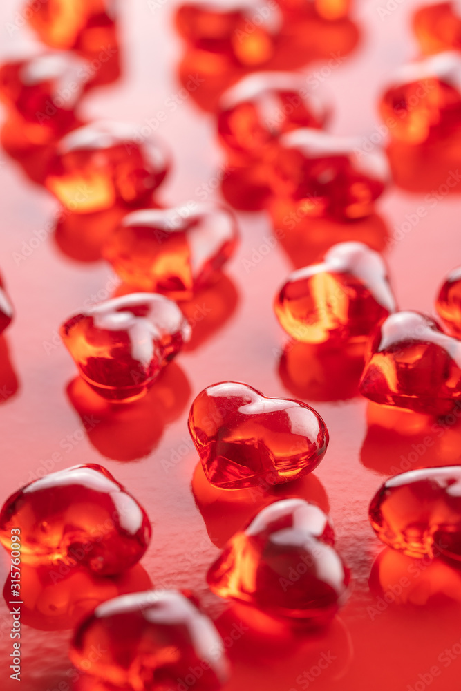 Red hearts on red background. Red hearts on red background.