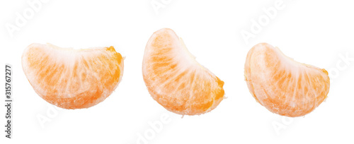 Set of tangerine slices on a white background