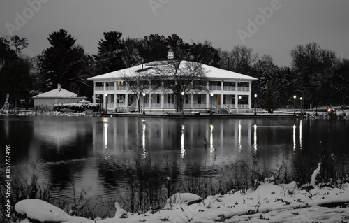House by lake in park