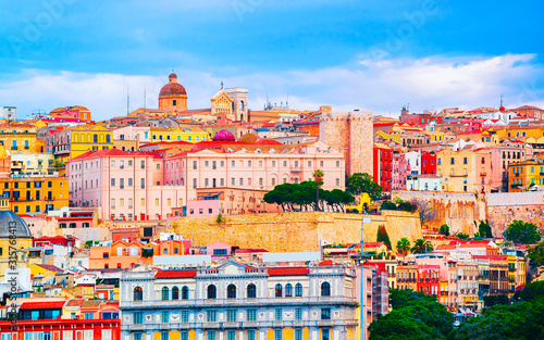 Cityscape of Old Sardenian city of Cagliari, South Sardinia Island in Italy in summer. View on town building architecture. Mixed media. photo