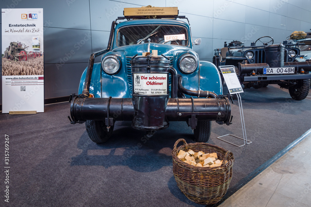 STUTTGART, GERMANY - MARCH 18, 2016: Compact car Opel Olympia OL38, 1938  with wood gas generator by Zanker, 1942. Europe's greatest classic car  exhibition "RETRO CLASSICS" Stock Photo | Adobe Stock