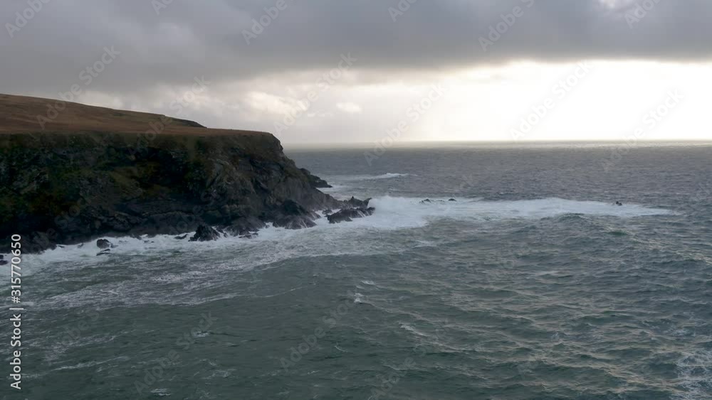 Aerial view of the beautiful coast at Malin Beg looking in County Donegal, Ireland. Aerial view of the beautiful coast at Malin Beg looking in County Donegal, Ireland.