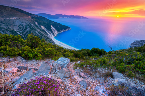 Fototapeta Naklejka Na Ścianę i Meble -  Beautiful summer sunset on Mirtos beach in Greece