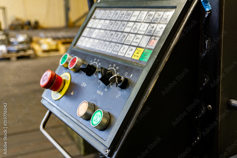 The remote control of a CNC machine for controlling mechanical processes in production. The remote control of a CNC machine for controlling mechanical processes in production.