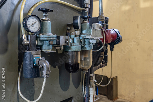 Hydraulic system of a metal cutting machine  high pressure oil s