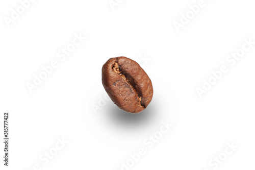  roasted coffee grain on a white plate close-up