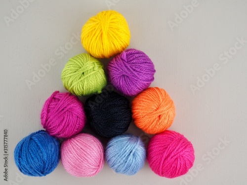 round balls of colourful yarn 