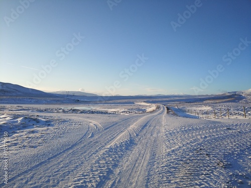 Picturesque winter landscape of Iceland. The perfect road to perspective