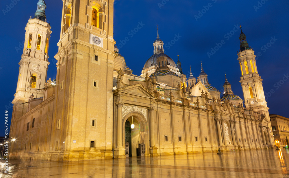 ZARAGOZA, SPAIN - MARCH 2, 2018: The cathedral  Basilica del Pilar at dusk.