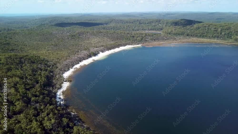 wide drone shot of Lake Mckenzie at Fraser Island Australia wide drone shot of Lake Mckenzie at Fraser Island Australia