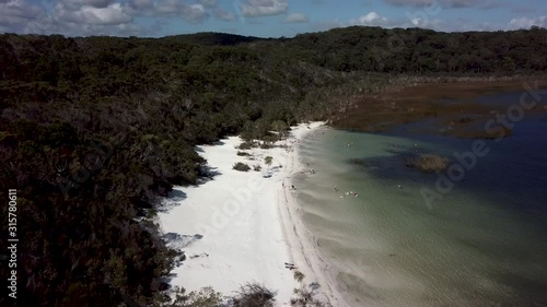 revealing drone shot of Lake Mckenzie at Fraser Island Australia photo