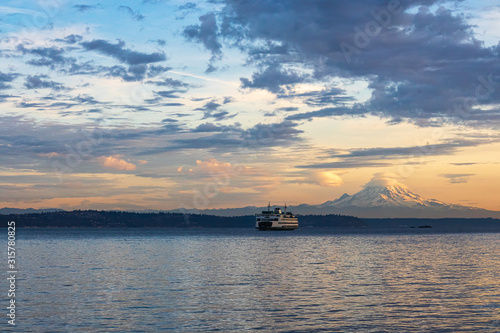 shoreline on bainbridge island with glow from the setting sun photo