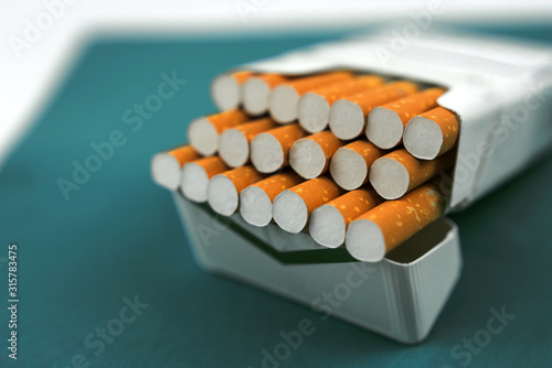  cigarettes with tobacco close-up.