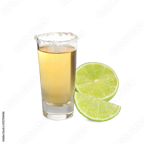 Mexican Tequila shot with salt and lime isolated on white