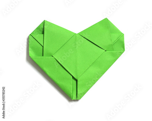 green heart recycled paper on white background