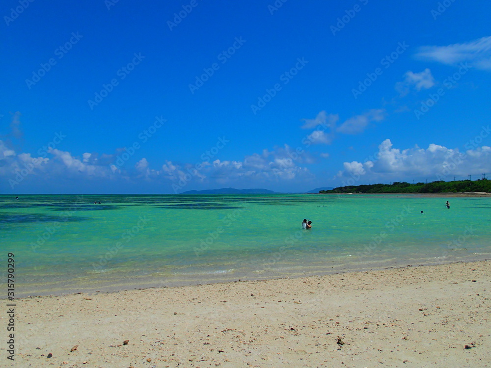 the beautiful beach of taketomi island in JAPAN the beautiful beach of taketomi island in JAPAN
