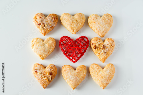 Heart shaped cookie pattern on a white background