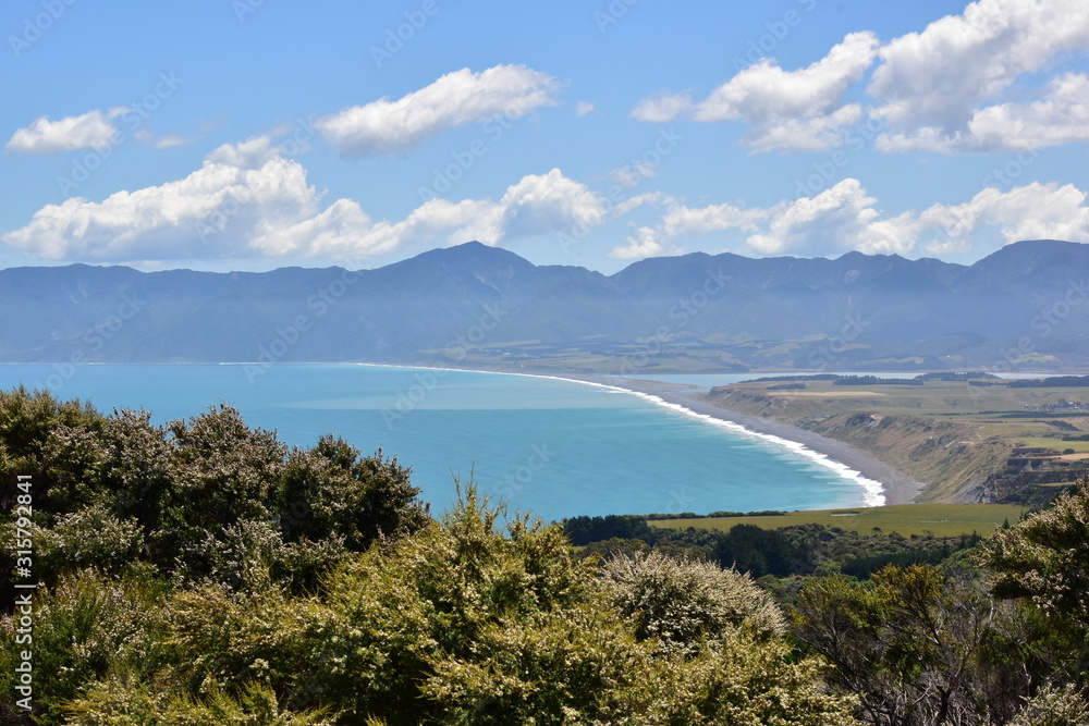 Cape Palliser bay view with coast and mountains in background