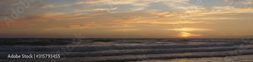 sunset over sea © adamentia