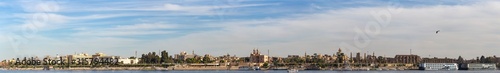 Luxor, Egypt, Karnak Temple, complex of Amun-Re. View of the ancient city of Thebes from the Nile. Panoramic city, view from the river. © Piotr