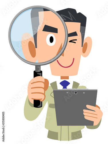 確認する工務店の男性