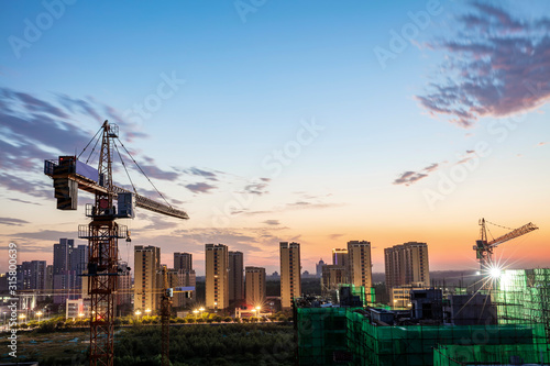 Tower cranes at night