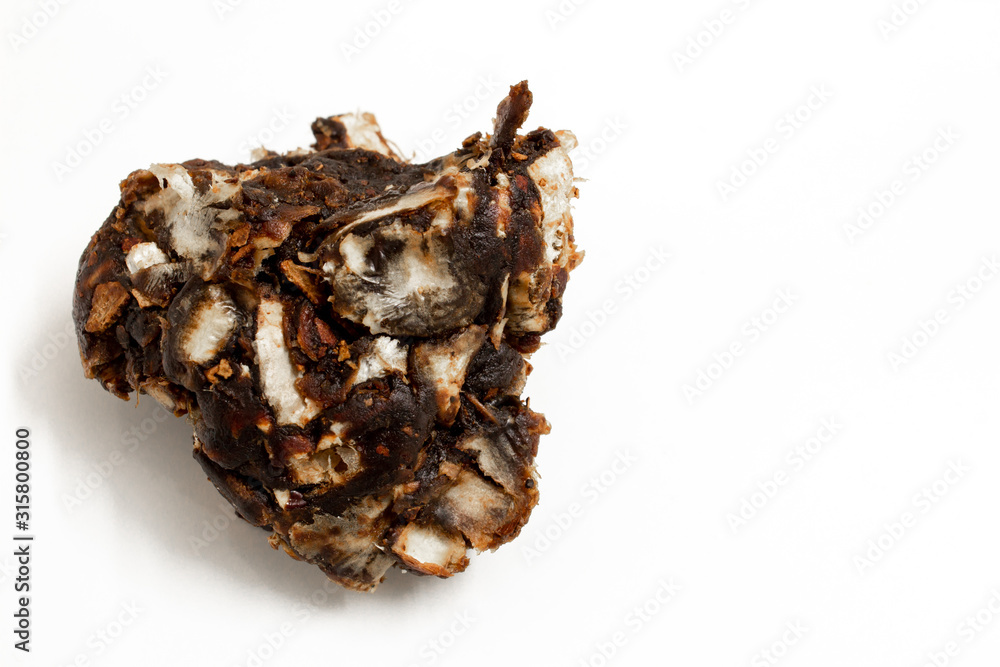 View of Tamarind Pulp over a white background. View of Tamarind Pulp over a white background.