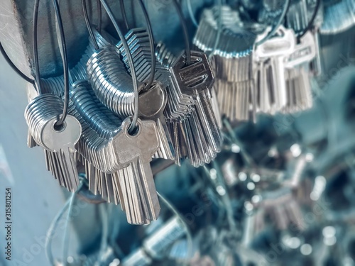 assortment, background, blue, bunch, business, car, choice, closeup, concept, copy, cutter, cutting, design, display, door, duplicate, equipment, futuristic, group, hooks, indoors, industry, iron, key