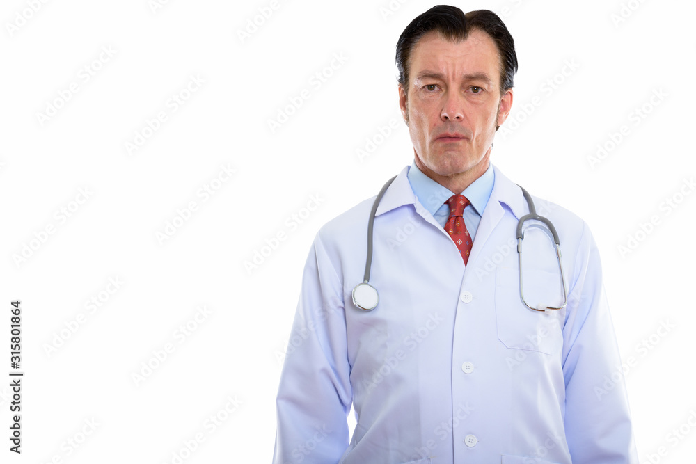 Studio shot of mature handsome man doctor Studio shot of mature handsome man doctor