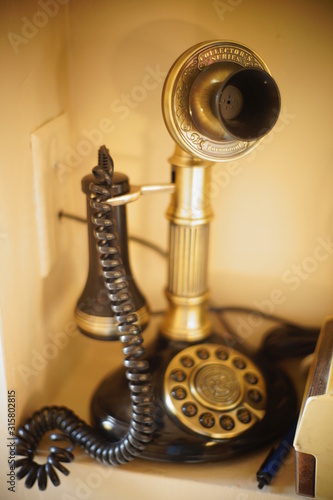 old telephone on table