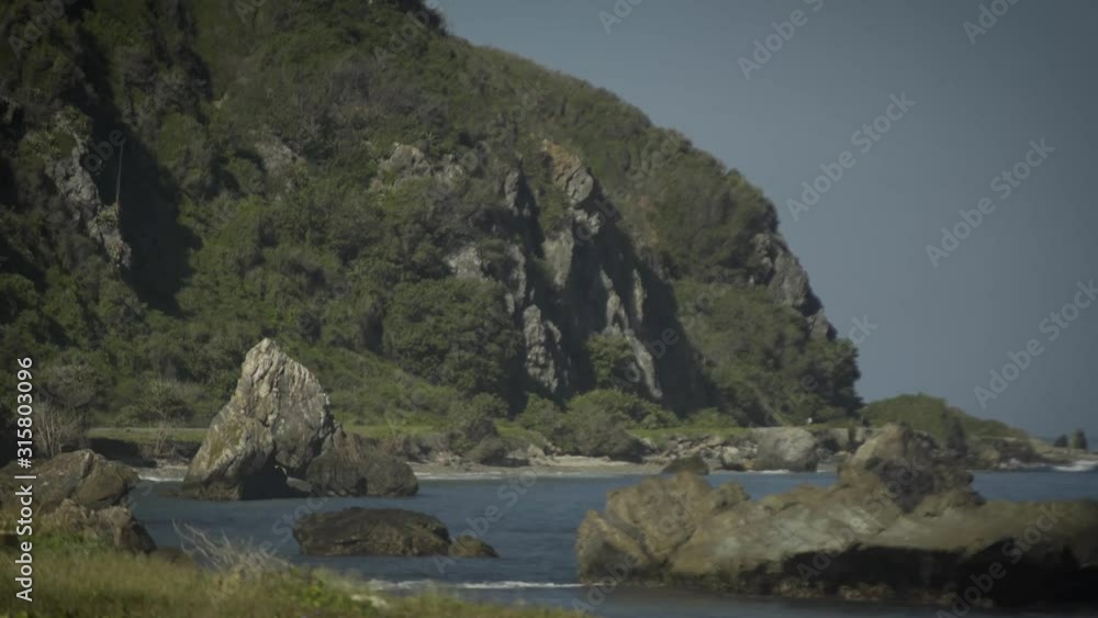 Calm sea in a rocky bay of the Caribbean Sea Calm sea in a rocky bay of the Caribbean Sea
